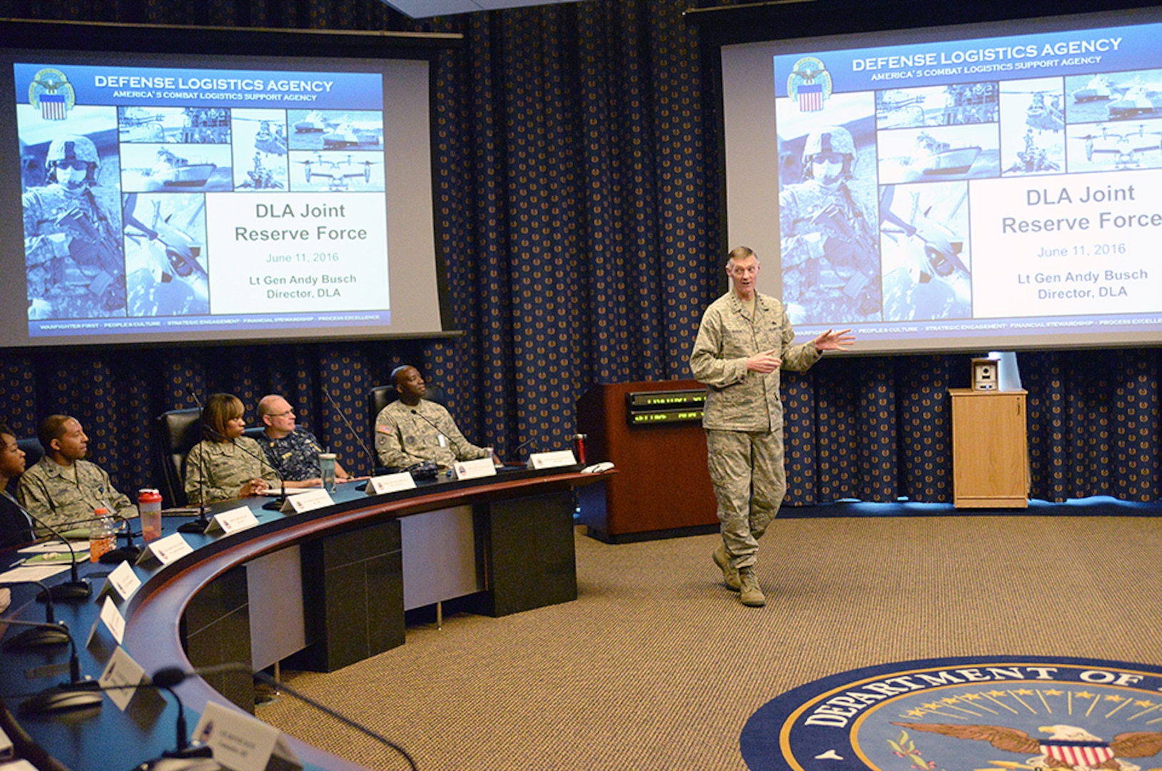 DLA Director Air Force Lt. Gen. Andy Busch addresses members of the Joint Reserve Force from throughout DLA during the Combined Drill Weekend June 11 at the McNamara Headquarters Complex, Fort Belvoir, Virginia. JRF leadership from throughout DLA attended, which focused on readiness, training and operational support to DLA. 