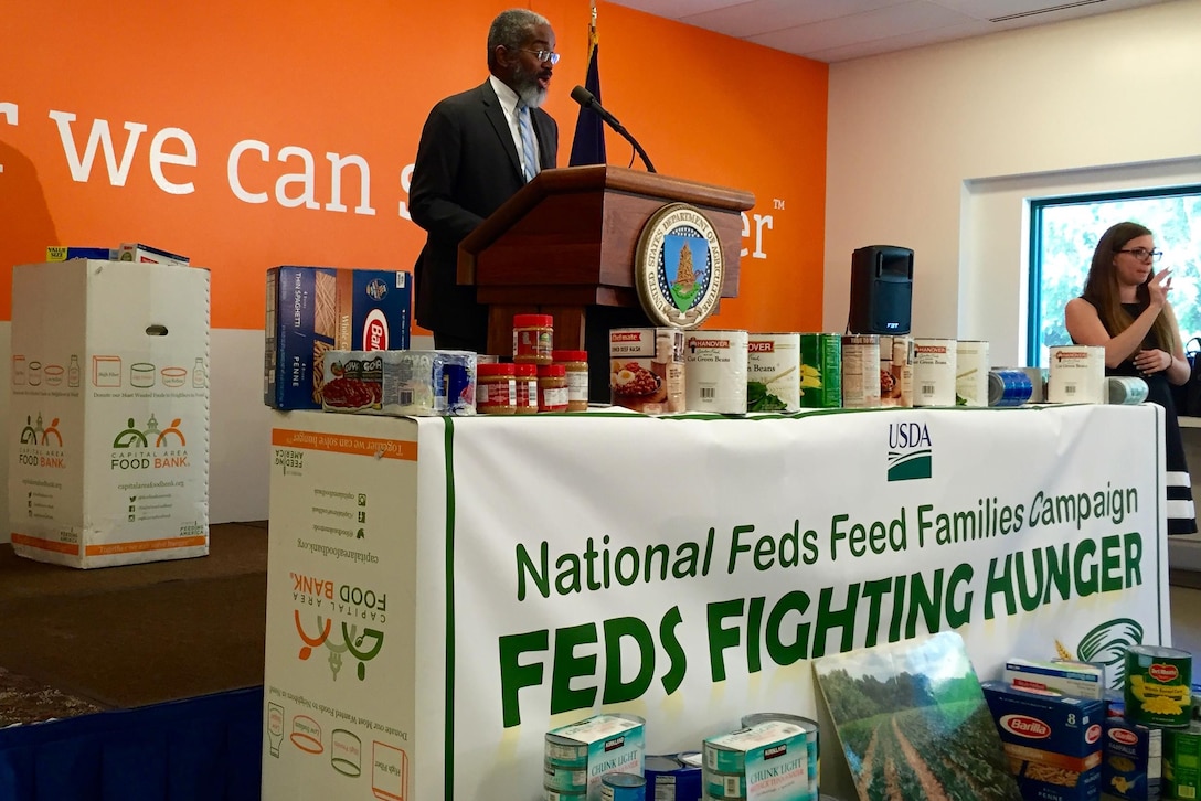 Dr. Gregory Parham, assistant secretary for administration of the Agriculture Department, speaks during the 2016 Feds Feed Families kickoff event at the Capital Area Food Bank in Washington, D.C., June 10, 2016. DoD photo by Susan Suddarth