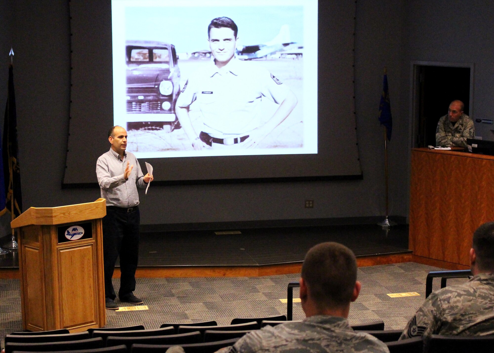 Chief Master Sgt. Matt Proietti, an Individual Mobilization Augmentee assigned to the 3rd Combat Camera Squadron, gives a talk about the life of Chief Master Sgt. Richard Etchberger to a group of Airman at Pease Air National Guard Base, Newington, New Hampshire. Etchberger was a radar technician who, in 2010, was posthumously awarded the Medal of Honor for his actions during a top-secret mission during the Vietnam War.