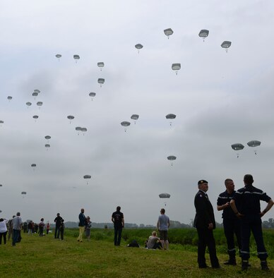 Paratroopers from the U.S., France and Germany participate in a D-Day remembrance jump June 5, 2016 at Sainte Mere- Eglise, France. More than 380 service members from Europe and affliated D-Day historical units participated in the 72nd anniversary as part of Joint Task Force D-Day 72. Members of the 314th Airlift Wing were part of the Task Force, based in Sainte Mere-Eglise, which supported events across Normandy, from May 30 - June 6 to commemorate the selfless actions by all the allies on D-Day that continue to resonate 72 years later. (U.S. Air Force photo by Senior Airman Mercedes Taylor) 