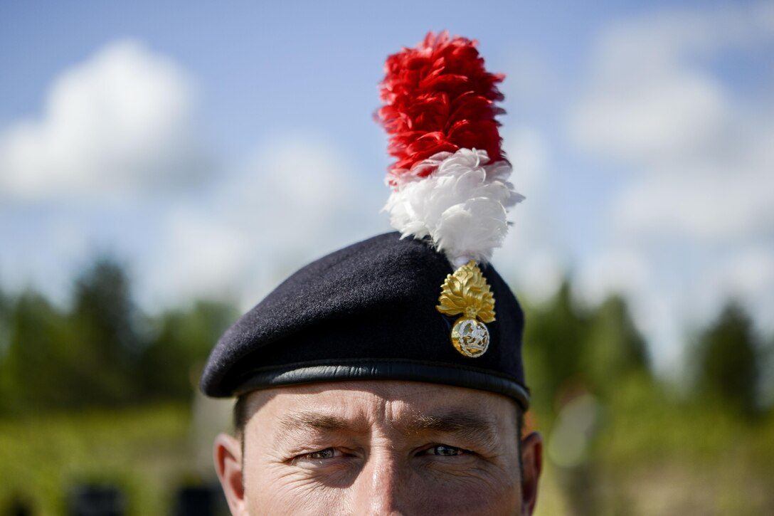 British army Maj. Duncan Allen, 1st Battalion Royal Regiment Fusiliers member, monitors his personnel during training exercise June 13, 2016, at Adazi Military Training Base, Latvia.  U.S. forces and NATO partners are in Europe participating in Saber Strike 16; a long-standing, U.S. Joint Chiefs of Staff-directed, U.S. Army Europe-led cooperative-training exercise, which has been conducted annually since 2010.  Our presence in Europe and the relationships built over the past 70 years provide the U.S. strategic access critical to meet our NATO commitment to respond to threats against our allies and partners. (U.S. Air Force photo/Senior Airman Nicole Keim)
