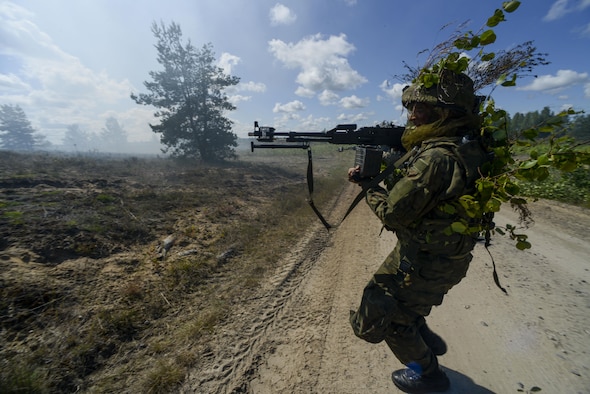 A Norwegian soldier attacks opposing forces during a training exercise June 13, 2016, at Adazi Military Training Base, Latvia.  U.S. forces and NATO partners are in Europe participating in Saber Strike 16; a long-standing, U.S. Joint Chiefs of Staff-directed, U.S. Army Europe-led cooperative-training exercise, which has been conducted annually since 2010.  Our presence in Europe and the relationships built over the past 70 years provide the U.S. strategic access critical to meet our NATO commitment to respond to threats against our allies and partners. (U.S. Air Force photo/Senior Airman Nicole Keim)