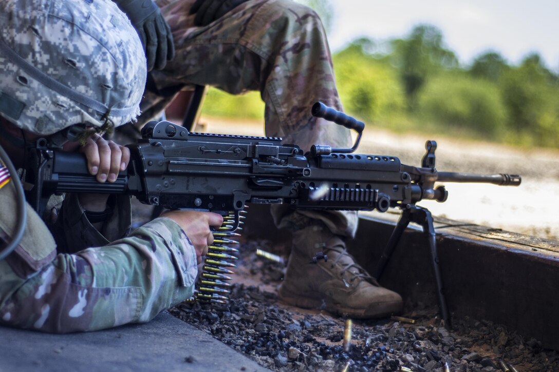 A soldier fires his M249 light machine gun at targets downrange on the weapons demonstration range at Fort Jackson, S.C., June 8, 2016. Army photo by Sgt. 1st Class Brian Hamilton