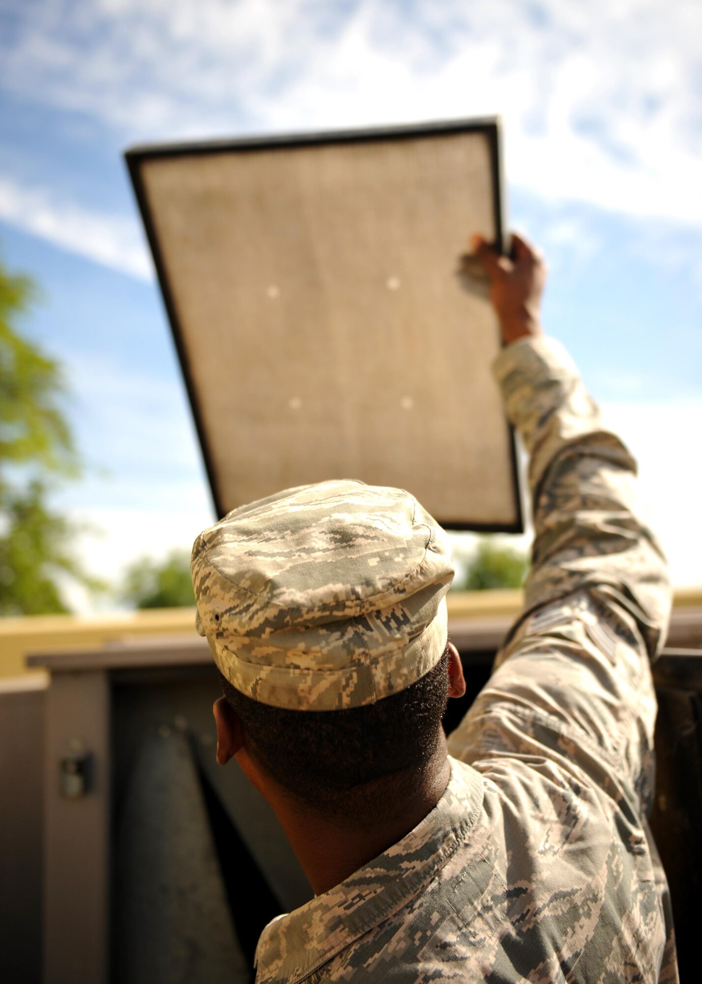 Senior Airman Lecassius Boyle, 9th Civil Engineer Squadron Heating, Ventilation and Air Conditioning (HVAC) technician, checks an air filter on a unit May 23, 2016, at Beale Air Force Base, California. HVAC technician’s install, operate, maintain, and repair heating, ventilation, air conditioning, and refrigeration (HVAC/R) systems, combustion equipment, and industrial air compressors. In addition, they also maintain and repair non-electric kitchen equipment. (U.S. Air Force photo by Staff Sgt. Jeffrey Schultze)