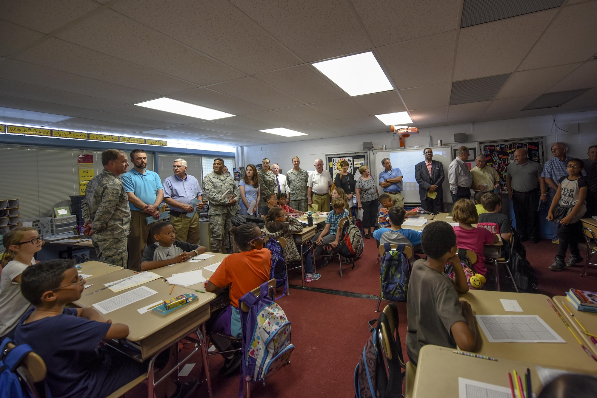 Several 4th Fighter Wing and civic leaders tour a classroom at Meadow Lane Elementary, May 11, 2016, in Goldsboro, North Carolina. More than 20 leaders toured the elementary school along with Spring Creek Middle School and Eastern Wayne High School as part of the Make It Better Children’s Education initiative. (U.S. Air Force photo by Airman Shawna L. Keyes)