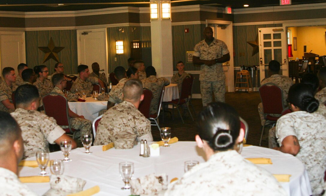 Sgt. Maj. Gerald Saunders, MCINCR-MCB Quantico sergeant major, addresses enlisted Marines at a monthly Troop Appreciation gathering and Professional Military Education session at The Clubs of Quantico June 1.