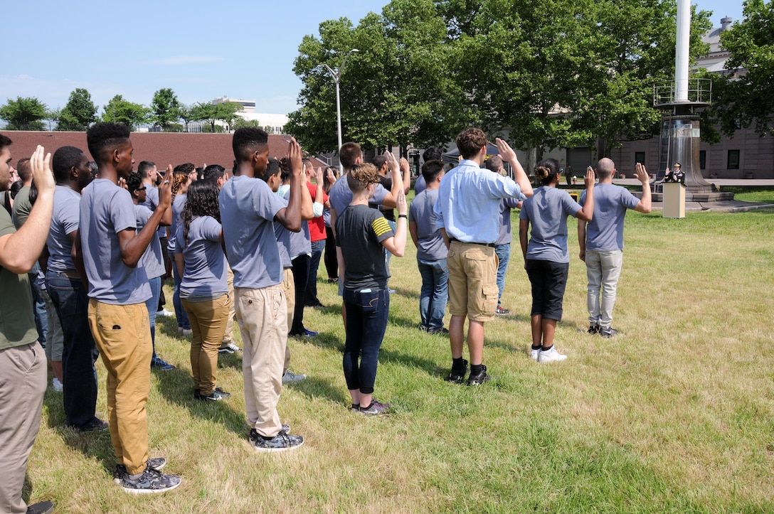 Maj. Gen. Margaret W. Boor, commanding general of the Army Reserve’s 99th Regional Support Command, administers the oath of enlistment to approximately 75 Army recruits during an Army Birthday celebration hosted by the U.S. Army Mid-Atlantic Recruiting Battalion June 11 in Trenton, New Jersey.