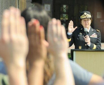 U.S. Army Maj. Gen. Margaret W. Boor, commanding general of the Army Reserve’s 99th Regional Support Command, administers the oath of enlistment to approximately 75 Army recruits during an Army Birthday celebration hosted by the U.S. Army Mid-Atlantic Recruiting Battalion in Trenton, N.J, June 11, 2016. (U.S. Army photo by Shawn Morris.)