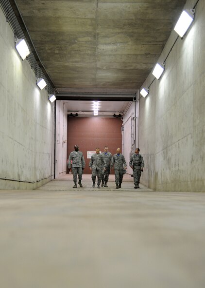 Leadership from the 319th Air Base Wing and 10th Space Warning Squadron walk up the exit ramp June 11, 2016, on Cavalier Air Force Station, N.D. Community members were given the opportunity to tour the Perimeter Acquisition Radar Attack Characterization System during the Cavalier AFS open house. (U.S. Air Force photo by Senior Airman Ryan Sparks/Released)