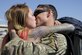 U.S. Air Force Staff Sgt. Scott, assigned to the 48th Rescue Squadron, embraces his wife after returning home from a 4-month-long deployment at Davis-Monthan Air Force Base, Ariz., June 8, 2016. Two of the three 48th RQS rescue teams, as well as a support team, returned home from a 4-month-long deployment to Turkey. (U.S. Air Force photo by Airman 1st Class Mya M. Crosby/Released)