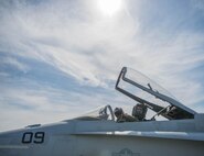 U.S. Marine Corps Stephen Morrison, a Marine Fighter Attack Squadron (VMFA) 314 quality assurance officer, prepares for a June 10, 2016, sortie in the Joint Pacific Alaska Range Complex (JPARC) flying in the number nine jet, which holds the highest flying hours in the U.S. Marine Corps F-18A Hornet inventory, during RED FLAG-Alaska (RF-A) 16-2. The exercise provides unique opportunities to integrate various forces into joint, coalition and multilateral training scenarios from simulated forward operating bases in the JPARC, which at more than 67,000 square miles, is the largest instrumented air, ground and electronic combat training range in the world. (U.S. Air Force photo by Staff Sgt. Shawn Nickel/Released)