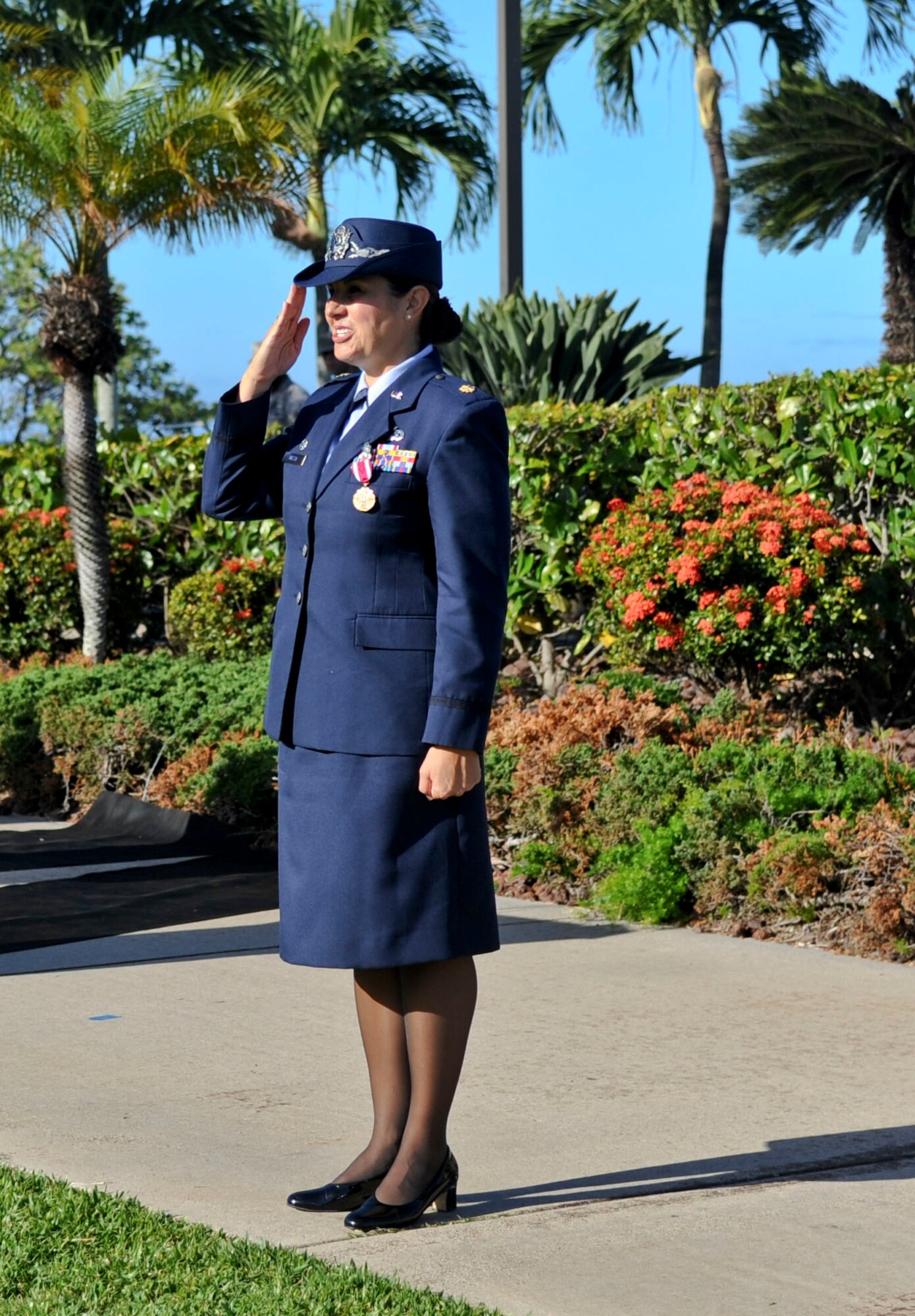 Maj. Dorinda Mazza, outgoing 15th Comptroller Squadron commander, renders one final salute before handing over command of the squadron to Maj. Andrew Gmytrasiewicz in a change-of-command ceremony at the Missing Man Formation June 10, 2016, on Joint Base Pearl Harbor-Hickam, Hawaii. (U.S. Air Force photo by Tech. Sgt. Terri Paden/Released)