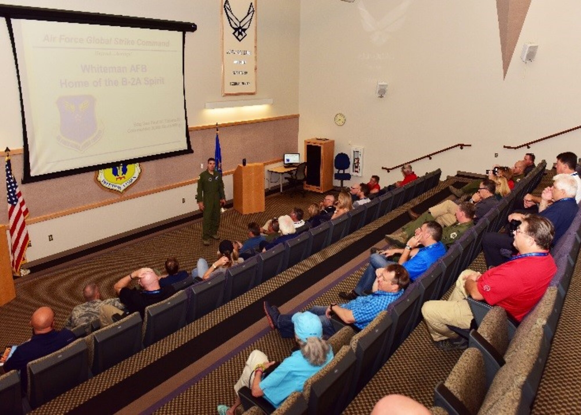 Brig. Gen. Paul Tibbets, 509 Bomb Wing commander, gives a briefing to Luke AFB civic leaders June 8 during the 944th Fighter Wing Civic Leader tour at Whiteman Air Force Base, Mo. (U.S. Air Force photo by Tech. Sgt. Louis Vega Jr.)