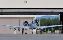 U.S. Air Force maintenance Airmen wait to launch an A-10 Thunderbolt II twin-engine, ground-attack aircraft assigned to the 354th Fighter Squadron (FS) out of Davis-Monthan Air Force Base, Ariz., for an afternoon sortie from Eielson Air Force Base, Alaska, June 6, 2016, during RED FLAG-Alaska (RF-A) 16-2. RF-A is a series of Pacific Air Forces commander-directed field training exercises that enable U.S. and partner nation forces like the 354 FS "Bulldogs" to sharpen their combat skills by flying simulated combat sorties in a realistic threat environment inside the more than 67,000 square mile Joint Pacific Alaska Range Complex, the largest instrumented air, ground and electronic combat training range in the world. (U.S. Air Force photo by Master Sgt. Karen J. Tomasik/Released)