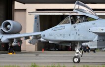 A U.S. Air Force A-10 Thunderbolt II twin-engine, ground-attack aircraft assigned to the 354th Fighter Squadron (FS) out of Davis-Monthan Air Force Base, Ariz., taxis past other A-10s along the Eielson Air Force Base, Alaska, flight line June 6, 2016, during RED FLAG-Alaska (RF-A) 16-2. RF-A is a series of Pacific Air Forces commander-directed field training exercises that enable U.S. and partner nation forces like the 354 FS "Bulldogs" to sharpen their combat skills by flying simulated combat sorties in a realistic threat environment. (U.S. Air Force photo by Master Sgt. Karen J. Tomasik/Released)