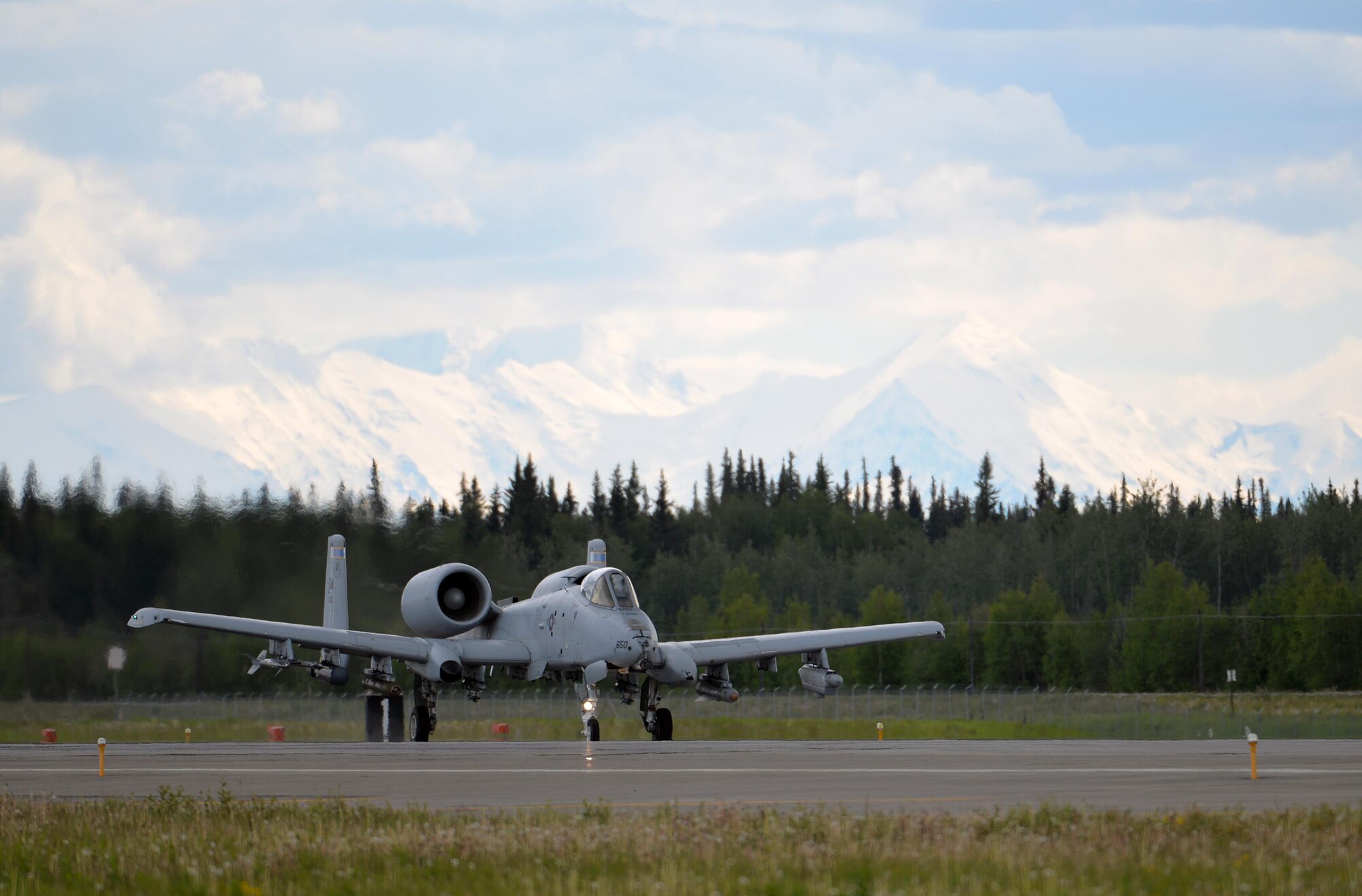A U.S. Air Force A-10 Thunderbolt II twin-engine, ground-attack aircraft assigned to the 354th Fighter Squadron (FS) out of Davis-Monthan Air Force Base, Ariz., increases speed to take off from the Eielson Air Force Base, Alaska, runway June 7, 2016, during RED FLAG-Alaska (RF-A) 16-2. RF-A is a series of Pacific Air Forces commander-directed field training exercises that enable U.S. and partner nation forces like the 354 FS "Bulldogs" to sharpen their combat skills by flying simulated combat sorties in a realistic threat environment inside the more than 67,000 square mile Joint Pacific Alaska Range Complex, the largest instrumented air, ground and electronic combat training range in the world. (U.S. Air Force photo by Master Sgt. Karen J. Tomasik/Released)