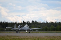 A U.S. Air Force A-10 Thunderbolt II twin-engine, ground-attack aircraft assigned to the 354th Fighter Squadron (FS) out of Davis-Monthan Air Force Base, Ariz., increases speed to take off from the Eielson Air Force Base, Alaska, runway June 7, 2016, during RED FLAG-Alaska (RF-A) 16-2. RF-A is a series of Pacific Air Forces commander-directed field training exercises that enable U.S. and partner nation forces like the 354 FS "Bulldogs" to sharpen their combat skills by flying simulated combat sorties in a realistic threat environment inside the more than 67,000 square mile Joint Pacific Alaska Range Complex, the largest instrumented air, ground and electronic combat training range in the world. (U.S. Air Force photo by Master Sgt. Karen J. Tomasik/Released)