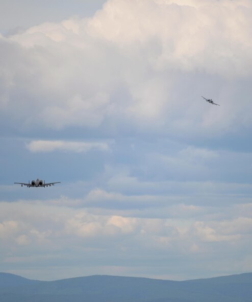 A pair of U.S. Air Force A-10 Thunderbolt II twin-engine, ground-attack aircraft assigned to the 354th Fighter Squadron (FS) out of Davis-Monthan Air Force Base, Ariz., depart from Eielson Air Force Base, Alaska, June 7, 2016, to fly toward the Joint Pacific Alaska Range Complex during RED FLAG-Alaska 16-2. U.S. and partner nation forces like the 354 FS "Bulldogs" use this Pacific Air Forces commander-directed field training exercise to sharpen their combat skills by flying simulated combat sorties in a realistic threat environment inside the more than 67,000 square mile Joint Pacific Alaska Range Complex, the largest instrumented air, ground and electronic combat training range in the world. (U.S. Air Force photo by Master Sgt. Karen J. Tomasik/Released)