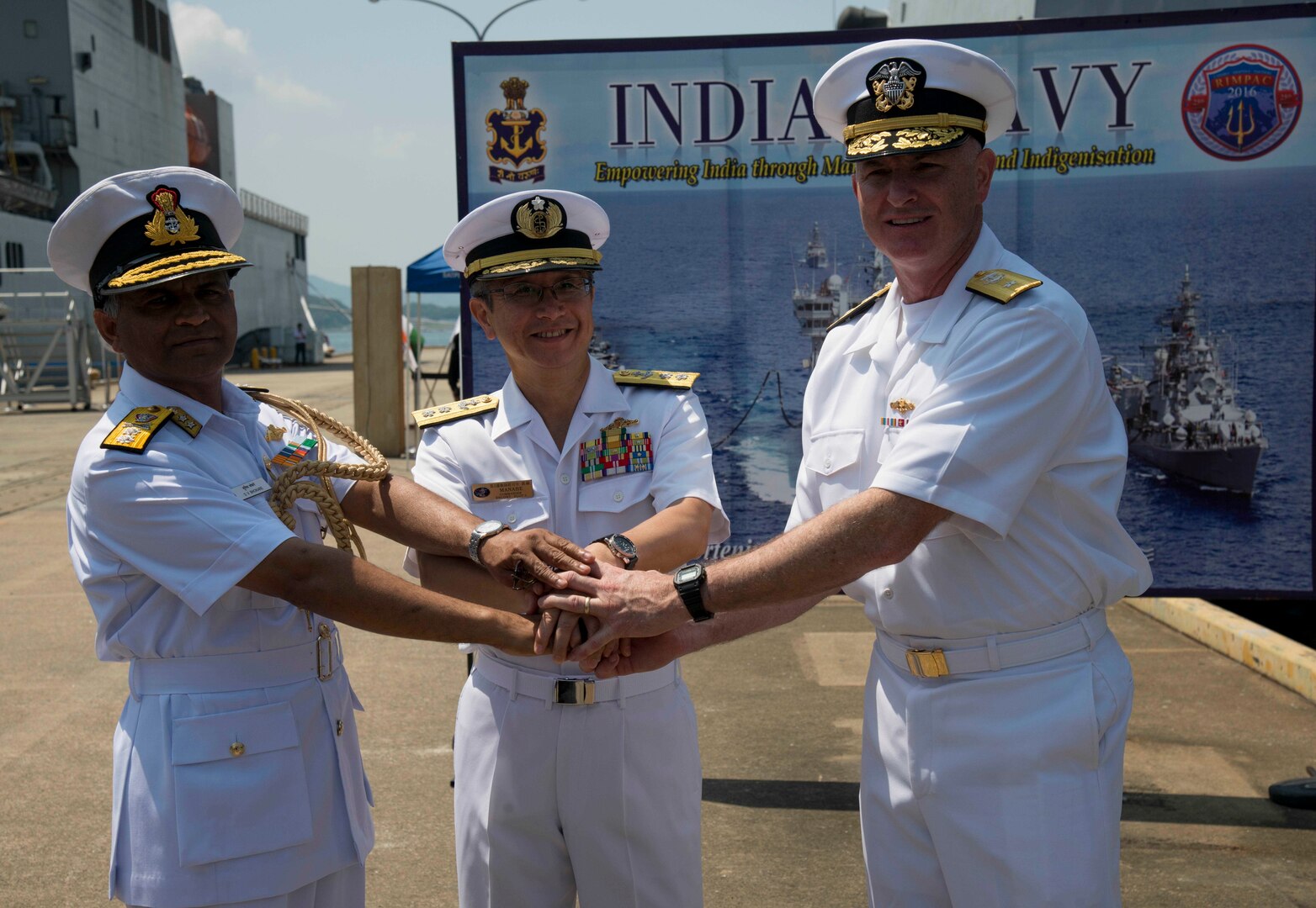 160610-N-QY759-141
 SASEBO, Japan (June 10, 2016) – Indian navy Flag Officer Commanding-in-Chief, Eastern Naval Command Vice Adm. Harish Bisht, Japan Maritime Self-Defense Force Escort Flotilla 3 Commander Rear Adm. Koji Manabe and U.S. 7th Fleet Deputy Commander Rear Adm. Brian Hurley shake hands after a Malabar 2016 press conference held at Commander, U.S. Fleet Activities Sasebo10 June. A trilateral maritime exercise, Malabar is designed to enhance dynamic cooperation between the Indian navy, Japan Maritime Self-Defense Force (JMSDF) and U.S. Navy forces in the Indo-Asia-Pacific. (U.S. Navy photo by Mass Communication Specialist 1st Class David R. Krigbaum/Released)