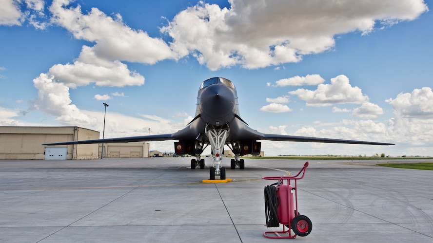 A B-1B Lancer from Dyess Air Force Base, Texas sits at Base Operations at Minot AFB, N.D., June 3, 2016. Aircraft from around Air Force Global Strike Command visited Minot for the 5th Bomb Wing change of command. (U.S. Air Force photos/Airman 1st Class J.T. Armstrong)
