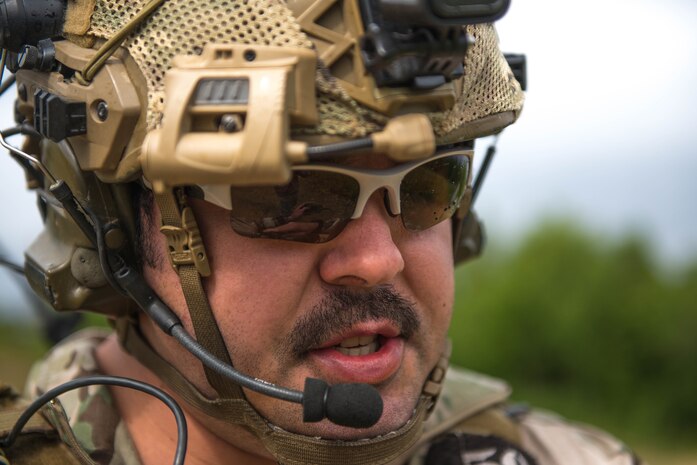 U.S. Air Force Staff Sgt. Jacob Rinker, a 13th Air Special Operations Squadron joint terminal attack controller out of Fort Carson, Colo., coordinates close air support for U.S. Soldiers in the Joint Pacific Alaska Training Range, June 8, 2016, during RED FLAG-Alaska 16-2. The exercise provides unique opportunities to integrate various forces into joint, coalition and multilateral training from simulated forward operating bases. (U.S. Air Force photo by Staff Sgt. Shawn Nickel/Released)