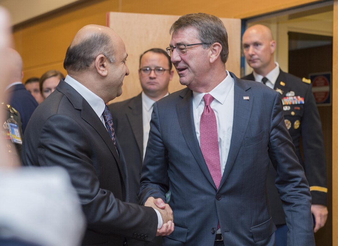 Defense Secretary Ash Carter, right, shakes hands with Turkish Defense Minister Fikri Isik at NATO headquarters in Brussels, June 14, 2016. Carter is in Brussels to attend a NATO defense ministers meeting ahead of the biannual NATO summit in July. DoD photo by Air Force Staff Sgt. Brigitte N. Brantley