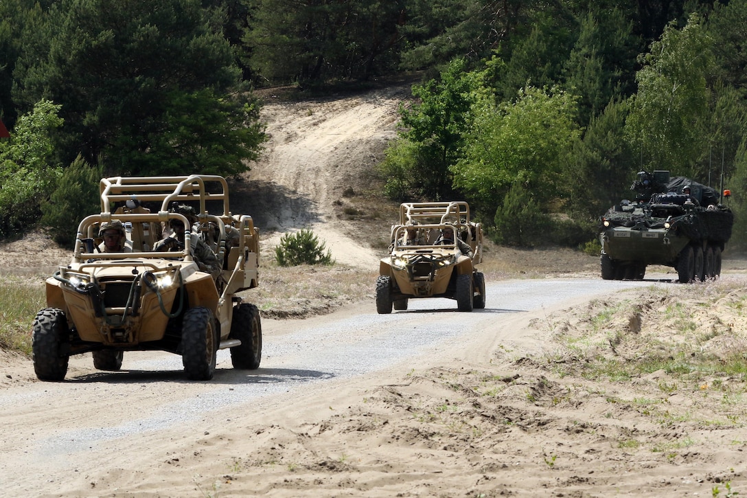 Paratroopers escort a convoy of tactical vehicles during Swift Response 16 in Torun, Poland, June 8, 2016. Army photo by Sgt. Juan F. Jimenez