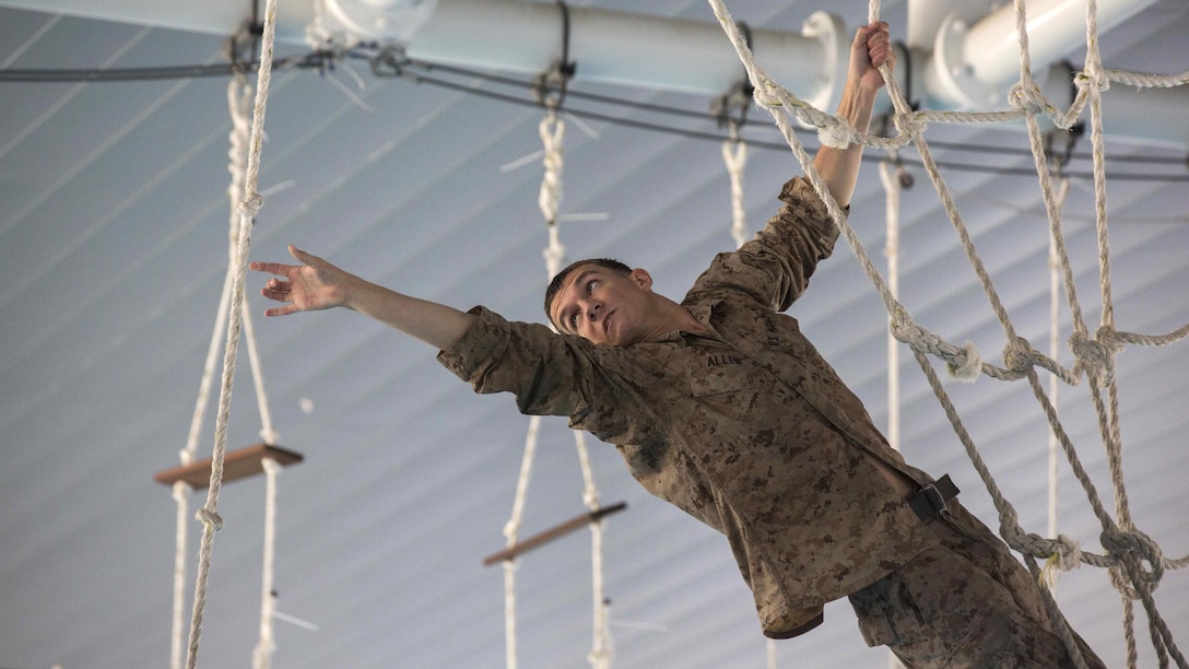 U.S. Marine Corps Cpl. Jackson T. Allen, a rifleman, reaches for the next rope on an over-water obstacle course at Gallipoli Barracks, Queensland, Australia, June 7, 2016. The course is part of a three day period of sustainment training to keep Marines in good physical condition during Marine Rotational Force – Darwin. MRF-D is a six-month deployment of Marines into Darwin, Australia, where they will conduct exercises and train with the Australian Defence Forces, strengthening the U.S.-Australia alliance. Allen, from Round Rock, Texas, is with 1st Battalion, 1st Marine Regiment, MRF-D.