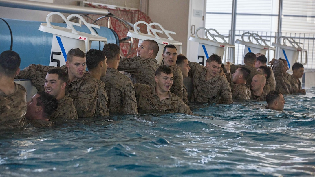 U.S. Marines with 1st Battalion, 1st Marine Regiment, Marine Rotational Force – Darwin, prepare to train on an over-water obstacle course at Gallipoli Barracks, Queensland, Australia, June 7, 2016. The course is part of a three day period of sustainment training to keep Marines in good physical condition during MRF-D. MRF-D is a six-month deployment of Marines into Darwin, Australia, where they will conduct exercises and train with the Australian Defence Forces, strengthening the U.S.-Australia alliance.