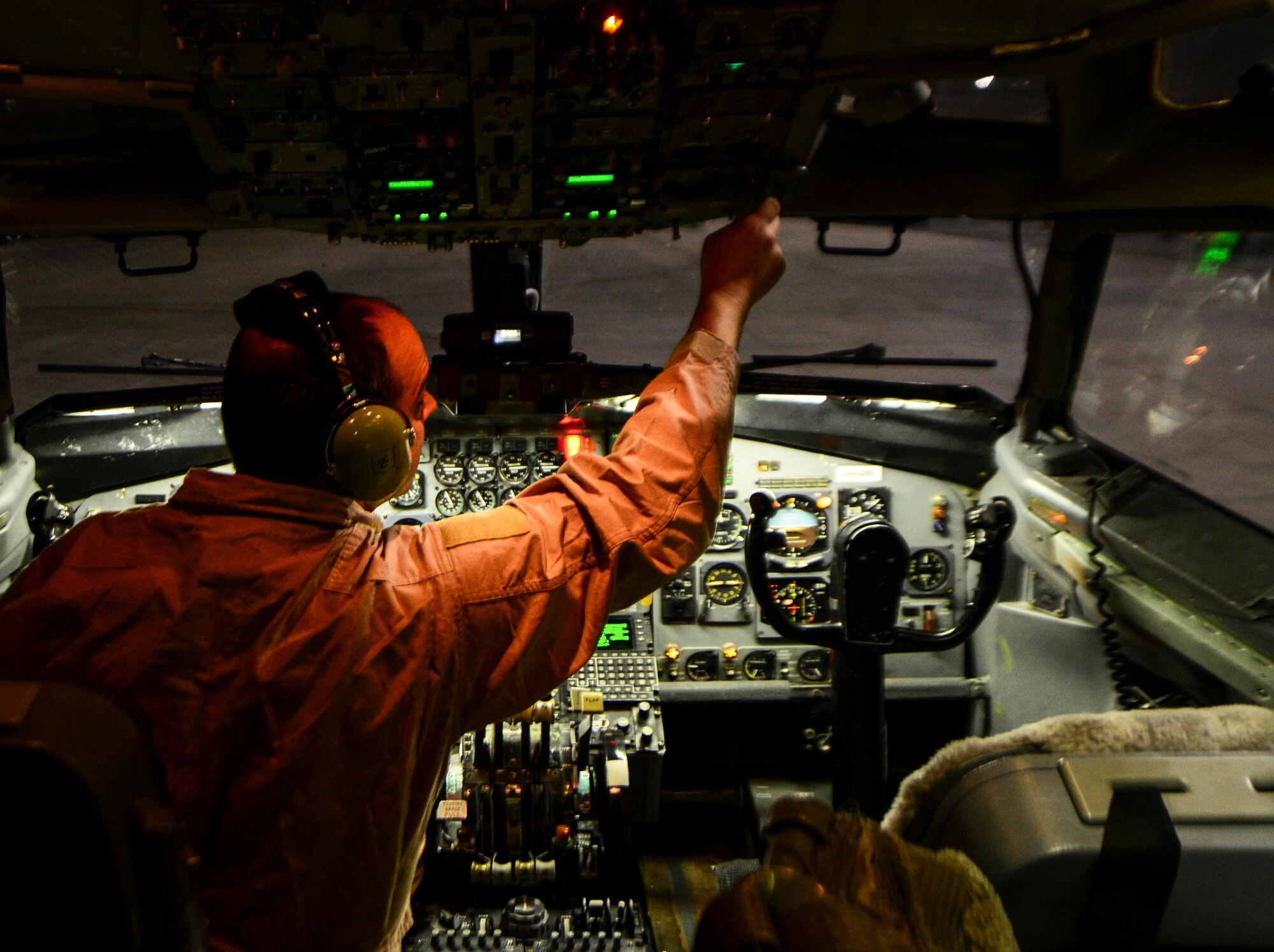 Master Sgt. Martin Siler, 7th Expeditionary Airborne Command and Control Squadron joint surveillance target attack radar systems flight engineer, conducts a pre-flight inspection on an E-8C Joint Surveillance Target Attack Radar Systems prior to takeoff June 8, 2016, at Al Udeid Air Base, Qatar. 7th EACCS aircrew and 7th Air Mobility Unit crew chiefs perform interior and exterior pre-flight inspections prior to every takeoff to ensure the safety of the crew flying and the mission. (U.S. Air Force photo/Senior Airman Janelle Patiño/Released)