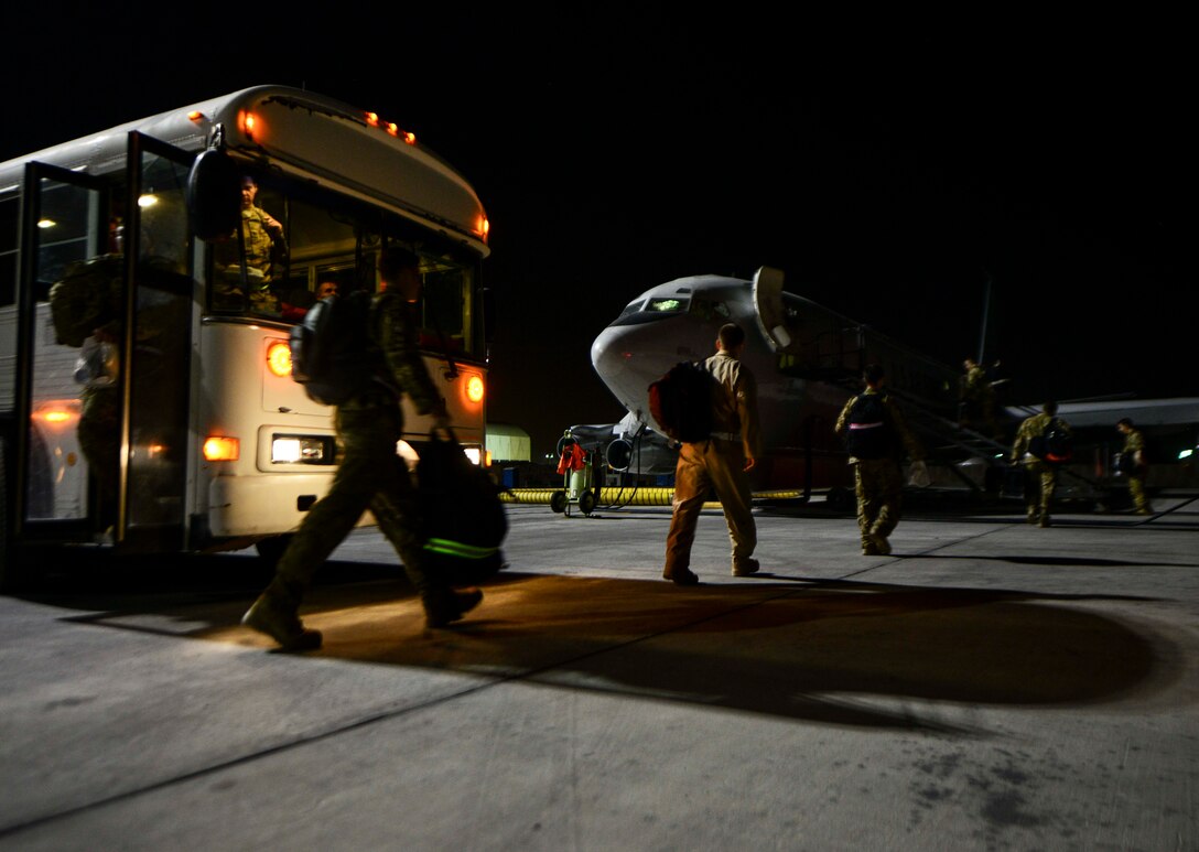 7th Expeditionary Airborne Command and Control Squadron Joint Surveillance Target Attack Radar Systems aircrew make their way to the E-8C JSTARS to prepare for departure June 8, 2016, at Al Udeid Air Base, Qatar. JSTARS aircrews provide support to both air and ground forces. The aircraft has the ability to track ground movement with its radar system. (U.S. Air Force photo/Senior Airman Janelle Patiño/Released)