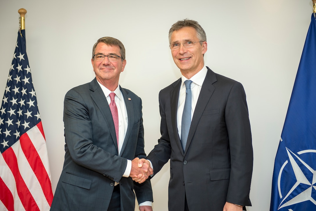 Defense Secretary Ash Carter shakes hands with NATO Secretary General Jens Stoltenberg at NATO headquarters in Brussels, June 14, 2016. DoD photo by Air Force Staff Sgt. Brigitte N. Brantley