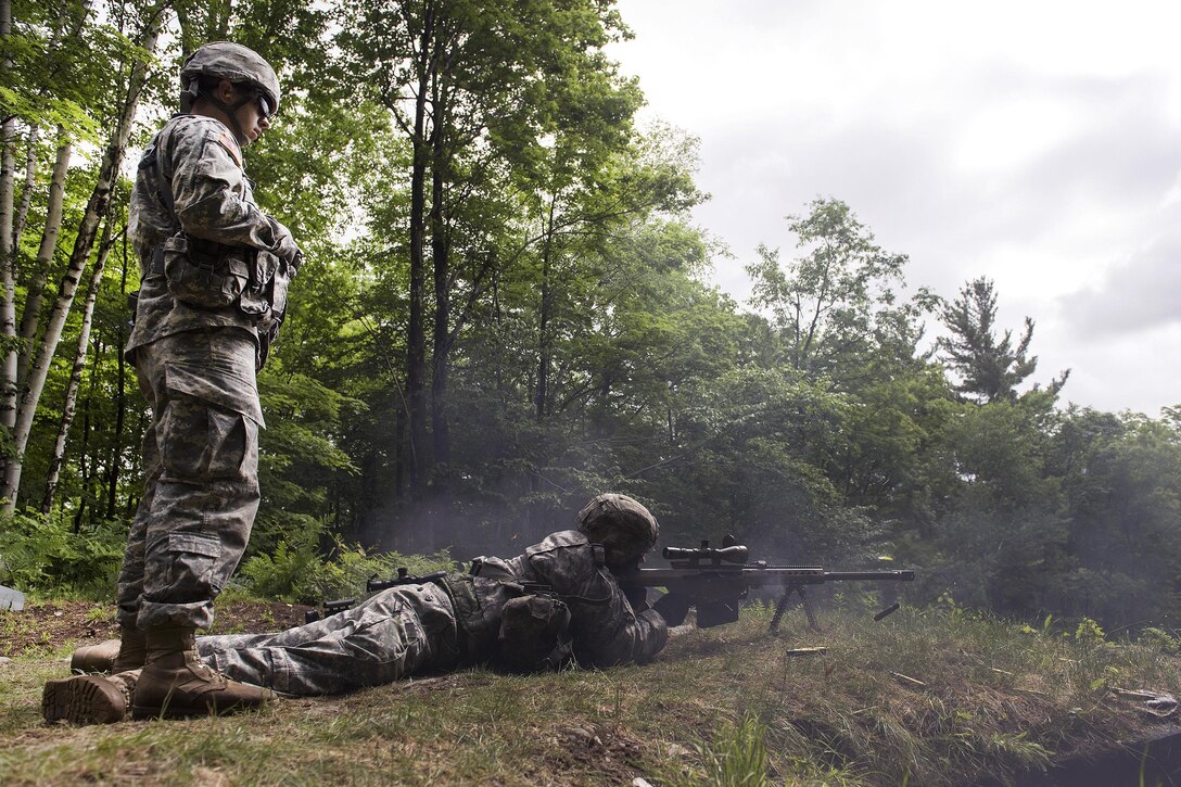 Army 2nd Lt. Joshua Baker fires an M-107 sniper rifle during weapons qualification at Camp Ethan Allen training site in Jericho, Vt., June 8, 2016. Baker is assigned to the Vermont National Guard’s Headquarters Company, 3rd Battalion, 172nd Infantry Regiment, 86th Infantry Brigade Combat Team, Mountain. Air National Guard photo by Tech. Sgt. Sarah Mattison