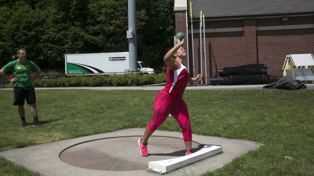 U.S. Marine Corps Sgt. Katherine Pagni throws a shotput during practice at the 2016 Department of Defense Warrior Games at the U.S. Military Academy at West Point, New York, June 13, 2016. Pagni, a Ceres, Calif., native, is a member of the 2016 DoD Warrior Games Team Marine Corps. The 2016 DoD Warrior Games is an adaptive sports competition for wounded, ill and injured Service members and veterans from the U.S. Army, Marine Corps, Navy, Air Force, Special Operations Command and the British Armed Forces. 