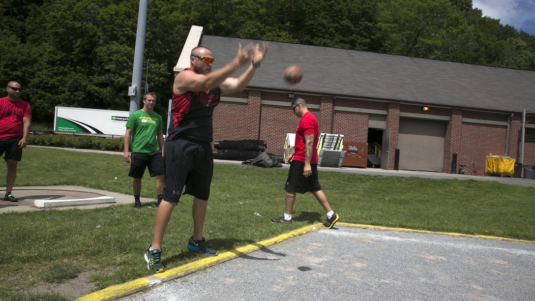 U.S. Marine Corps veteran Clayton McDaniel executes his first warm-up throw at shotput practice during the 2016 Department of Defense Warrior Games at the U.S. Military Academy at West Point, New York, June 13, 2016. McDaniel, a Molalla, Ore., native, is a member of the 2016 DoD Warrior Games Team Marine Corps. The 2016 DoD Warrior Games is an adaptive sports competition for wounded, ill and injured Service members and veterans from the U.S. Army, Marine Corps, Navy, Air Force, Special Operations Command and the British Armed Forces.