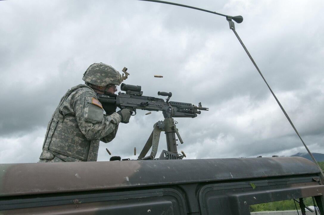 Army Cadet Matthew Shea fires an M-240 from a mounted gunnery turret position at Camp Ethan Allen training site in Jericho, Vt., June 8, 2016. Shea is assigned to the Vermont National Guard’s Company D, 3rd Battalion, 172nd Infantry Regiment, 86th Infantry Brigade Combat Team, Mountain. Army National Guard photo by Spc. Avery Cunningham