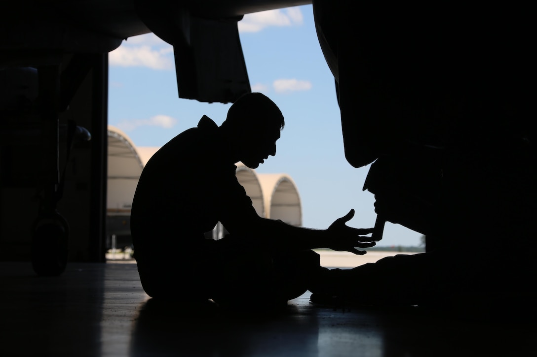 Cpl. Nicholas Stone performs maintenance on a AV-8B Harrier inside the Marine Attack Training Squadron 203 hangar at Marine Corps Air Station Cherry Point, N.C., June 8, 2016. During the past three years, VMAT-203 has trained more than 130 AV-8B pilots and 2,000 AV-8B maintenance personnel. Within that time period, the squadron has flown over 12,000 flight hours, participated in four deployments for instructor and student training and received the Commandant's Aviation Efficiency Award. Stone is a fixed wing aircraft airframe mechanic with the Squadron. (U.S. Marine Corps photo by Cpl. N.W. Huertas/ Released)