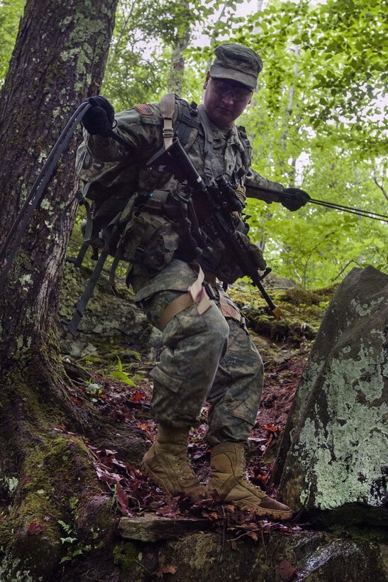 A soldier participates in a hasty rope rappel at Camp Ethan Allen training site in Jericho, Vt., June 10, 2016. Army National Guard photo by Spc. Avery Cunningham