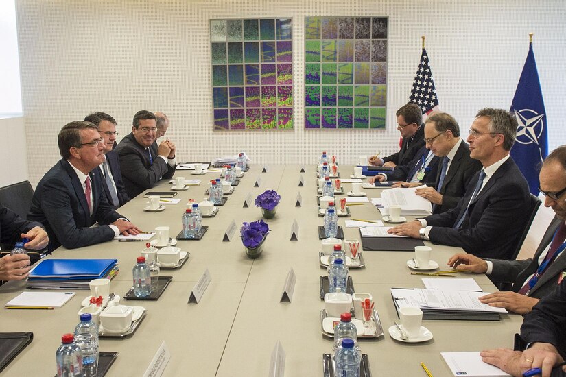 Defense Secretary Ash Carter, left, talks with NATO Secretary General Jens Stoltenberg, right, at NATO headquarters in Brussels, June 14, 2016, during a meeting of NATO defense minister. The two leaders met to discuss matters of mutual importance. DoD photo by Air Force Senior Master Sgt. Adrian Cadiz
