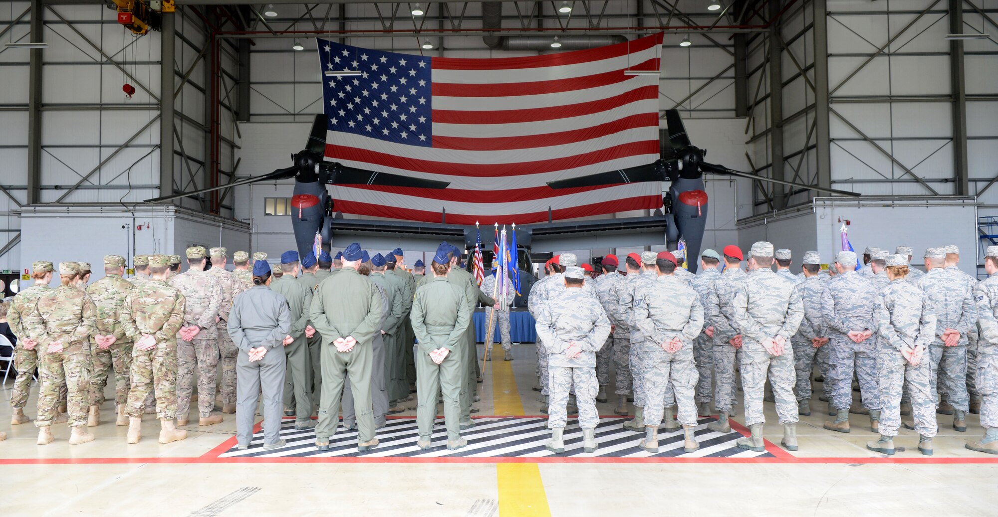 U.S. Air Force Airmen from the 352nd Special Operations Wing stand at parade rest during a change of command ceremony June 10, 2016, on RAF Mildenhall, England. This ceremony welcomed Col. Lance E. Schmidt as the new 752nd Special Operations Group commander. (U.S. Air Force photo by Airman 1st Class Tenley Long/Released)