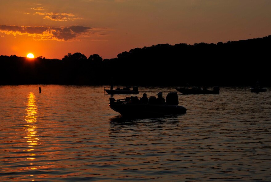Airmen assigned to McConnell Air Force Base, Kan., and American Bass Anglers members wait for the start of a fishing tournament, June 11, 2016, at Big Hill Lake in Cherryvale, Kan. Airmen spent eight hours on the lake fishing alongside ABA members during this year’s Take an Airman Fishing event. (U.S. Air Force photo/Airman Erin McClellan)