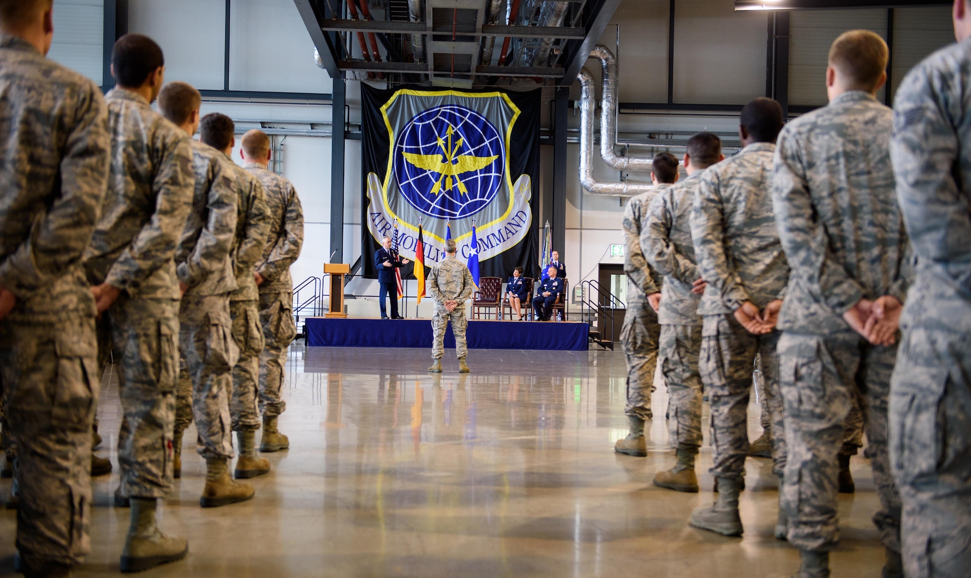 Airmen from the 521st Air Mobility Operations Wing listen to Maj. Gen. Frederick Martin, U.S. Air Force Expeditionary Center commander, at Ramstein Air Base, Germany, June 14, 2016. Martin was the presiding officer during the 521st AMOW change of command with Col. Thomas Cooper as he became the new commander. (U.S. Air Force photo/Staff Sgt. Armando A. Schwier-Morales)