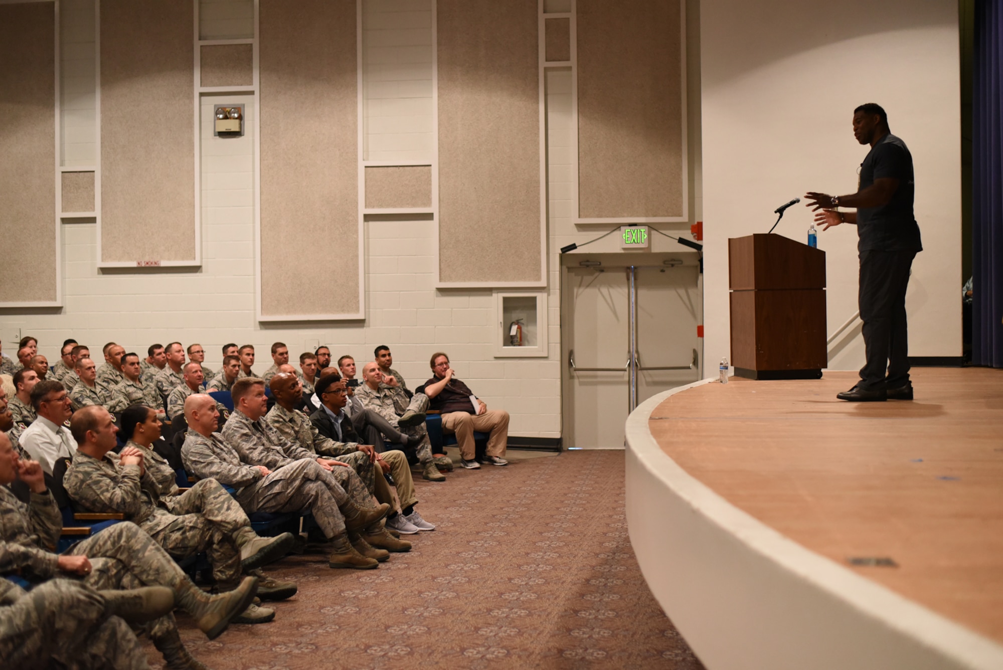 PETERSON AIR FORCE BASE, Colo. – Herschel Walker, retired NFL football player, speaks about resiliency to Team Pete in the base auditorium at Peterson Air Force Base, Colo. on June 8, 2016. Walker began his professional football career with the New Jersey Generals of the United States Football League before joining the Dallas Cowboys of the National Football League. (U.S. Air Force photo by Airman 1st Class Dennis Hoffman)