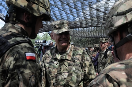 Lt. Gen. David E. Quantock, the U.S. Army Inspector General, speaks with members of the Polish Army during a mass casualty response demonstration as part of Anakonda 2016, June 11, near Chełmno, Poland. Anakonda 2016 is one of U.S. Army Europe's premier multinational training events, which features 24 nations and seeks to train, exercise and integrate Polish national command and force structures into an allied, joint, multinational environment.