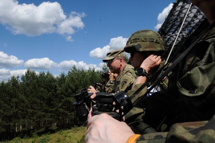 Lt. Gen. Ben Hodges, commander of U.S. Army Europe, observes a mass casualty response demonstration, which featured a convoy, live explosives, and dozens of roleplayers in realistic combat wound make-up, as part of Anakonda 2016, June 11, in Chełmno, Poland. Anakonda 2016 is one of U.S. Army Europe's premier multinational training events, which features 24 nations and seeks to train, exercise and integrate Polish national command and force structures into an allied, joint, multinational environment.