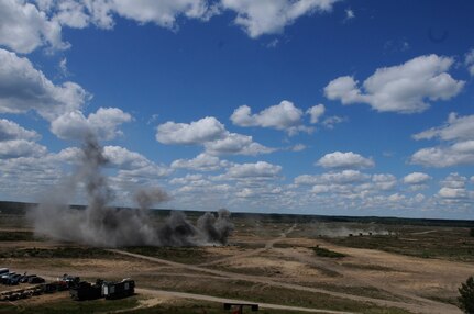 Smoke from a live detonation fills the sky during a mass casualty response demonstration, which featured the convoy, live explosives, and dozens of roleplayers in realistic combat wound make-up, as part of Anakonda 2016, June 11, near Chełmno, Poland. Anakonda 2016 is one of U.S. Army Europe's premier multinational training events, which features 24 nations and seeks to train, exercise and integrate Polish national command and force structures into an allied, joint, multinational environment.