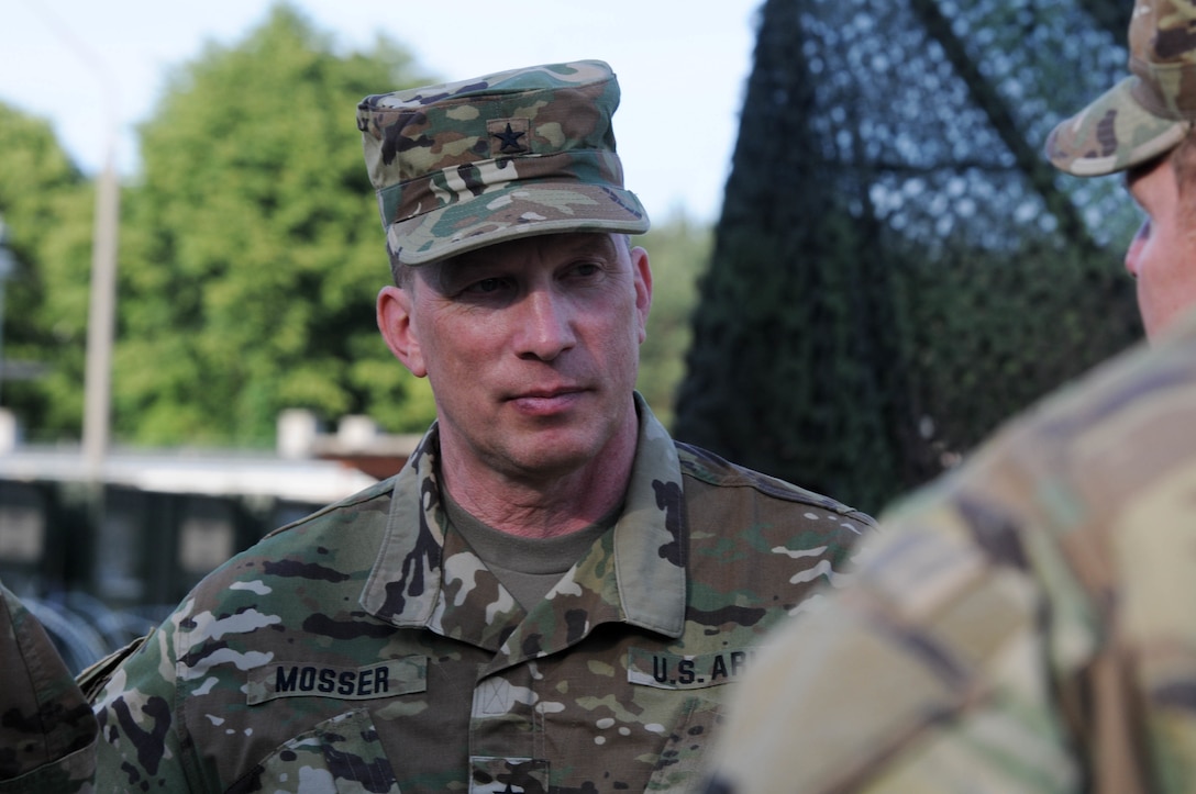 Brig. Gen. Gregory J. Mosser, commander of the 364th Expeditionary Sustainment Command, visits the operation center for the 30th Medical Company during Anakonda 2016, June 9 in Warsaw, Poland.  Anakonda 2016 is one of U.S. Army Europe's premier multinational training events, which features 24 nations and seeks to train, exercise and integrate Polish national command and force structures into an allied, joint, multinational environment.