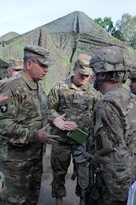 Lt. Gen. Ben Hodges, commander of U.S. Army Europe, visits the operation center for the 30th Medical Company during Anakonda 2016, June 9 in Warsaw, Poland.  Anakonda 2016 is one of U.S. Army Europe's premier multinational training events, which features 24 nations and seeks to train, exercise and integrate Polish national command and force structures into an allied, joint, multinational environment.