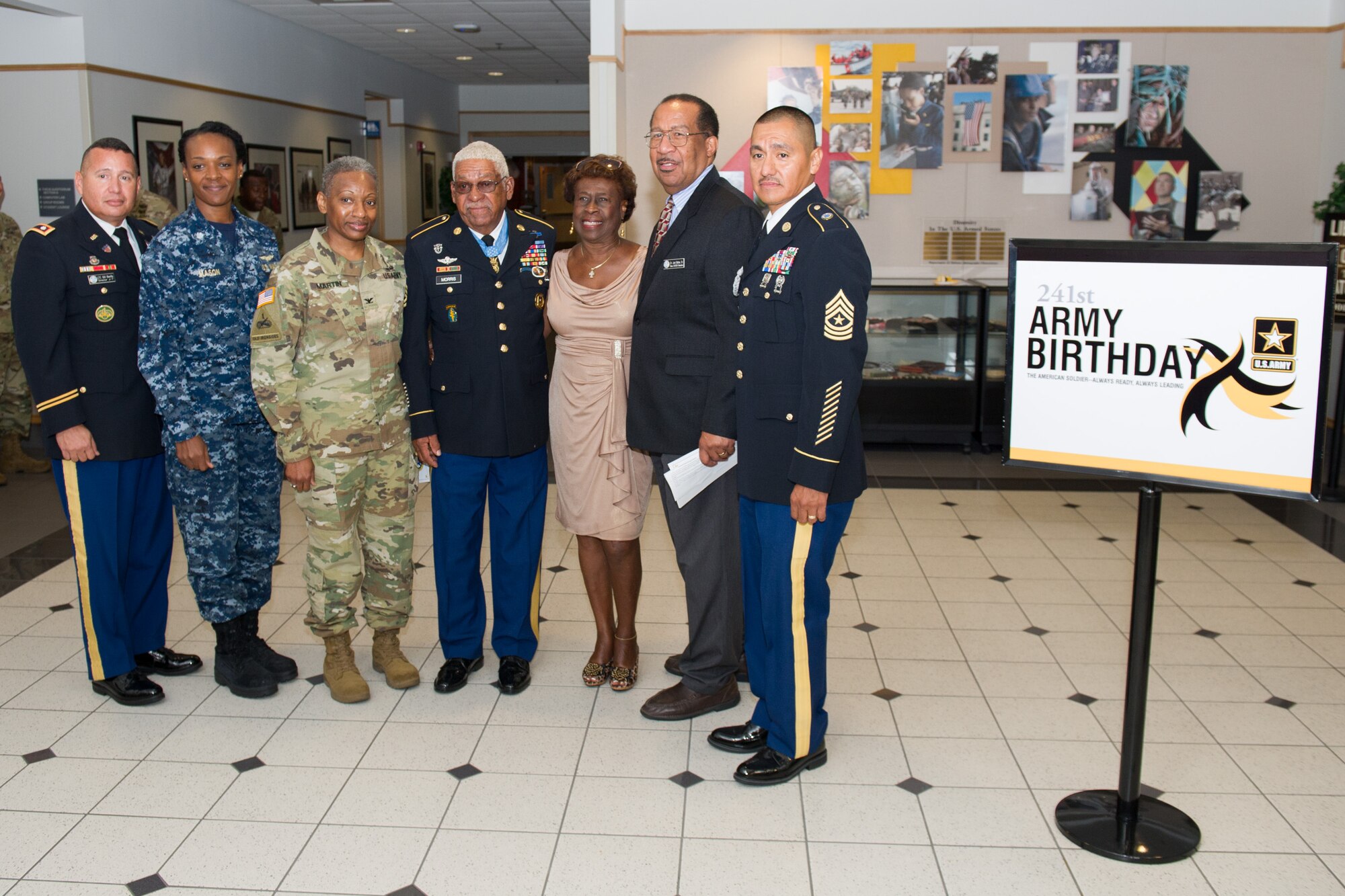 Members of Patrick Air Force Base and Cape Canaveral Air Force Station, Fla. celebrated the U.S. Army’s 241st Birthday during a cake cutting ceremony at Defense Equal Opportunity Management Institute June 14, 2016. Medal of Honor recipient retired Sergeant 1st Class Melvin Morris, was the guest speaker for the event and shared his feelings about how honored he is to be a part of the military family and shared stories from his days on active duty. (U.S. Air Force photo/Benjamin Thacker/Released) 