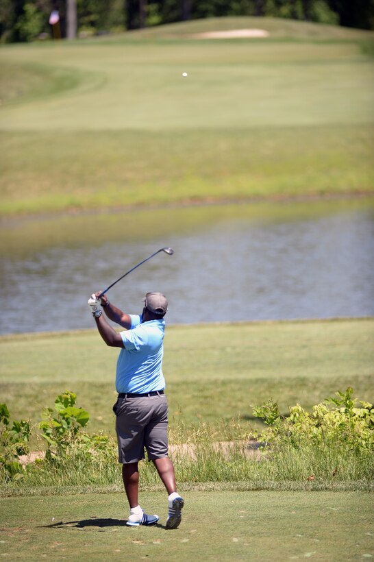 Dewitt Osborne, an Army veteran, tees off during the 9th Annual ESPN 980 True Heroes Charity Golf Tournament at the 1757 Golf Club in Sterling, Va., June 13, 2016. DoD photo by Marvin D. Lynchard